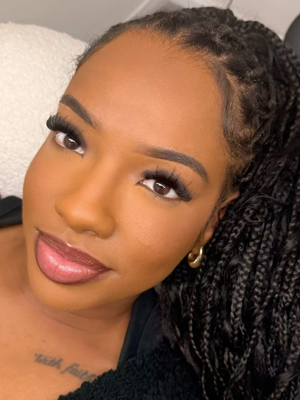 Portrait showing a full lash look with longer wispy details.